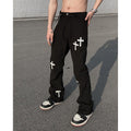 Men's Cross Print Trousers – Relaxed Streetwear Pants in Black or White