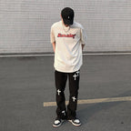 Men's Cross Print Trousers – Relaxed Streetwear Pants in Black or White